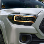Load image into Gallery viewer, Diode Dynamics Form Lightning 2016-2023 Toyota Tacoma Sequential LED Projector Headlights with Amber DRL (pair)
